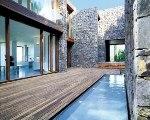 Ampliación de Vivienda entre muros de piedra casa-muros-piedra-rodeno