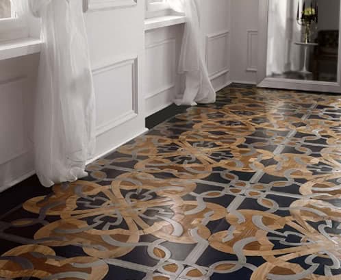 suelo-mosaico-madera-acero-piedra