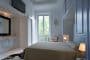 dormitorio-con-lavabo-apartamento-Milan