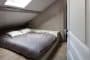 dormitorio techo inclinado
