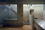 escalera vista desde la cocina, en la House For Three Children